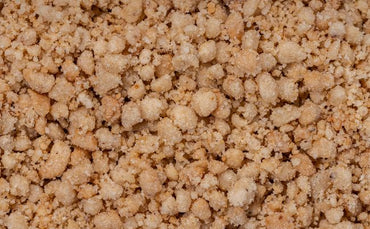 Crumble senza glutine SaporePuro al gusto nocciola, confezione da 1kg con crumble croccante e dorato, ideale per dolci e dessert.